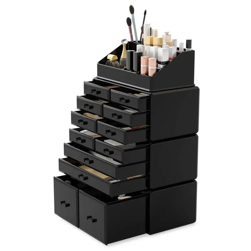 The UNIQ XXL Organiser with 12 drawers and 16 compartments in black by UNIQ stores cosmetics, brushes, nail polish, and other beauty items neatly arranged on top and inside open drawers.