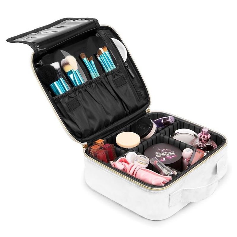 The UNIQ makeup travel bag in white features adjustable compartments, neatly organizing brushes, cosmetics, skincare, lipsticks, perfumes, and other beauty essentials. Perfect as a toiletry or cosmetic bag for all your makeup needs.